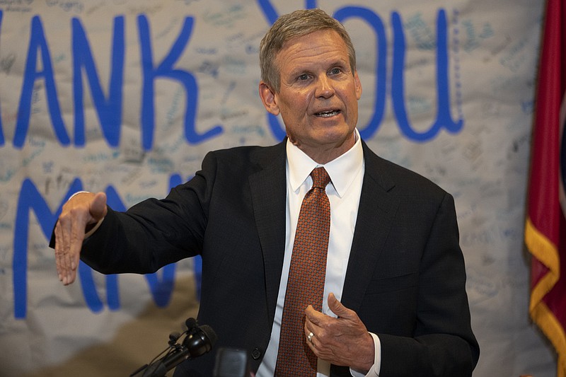 Gov. Bill Lee responds to questions during a news conference Tuesday in Nashville. Lee held the news conference to talk about gun control legislation and an executive order to require information for background checks on gun purchases to be updated more rapidly. (AP Photo/George Walker IV)