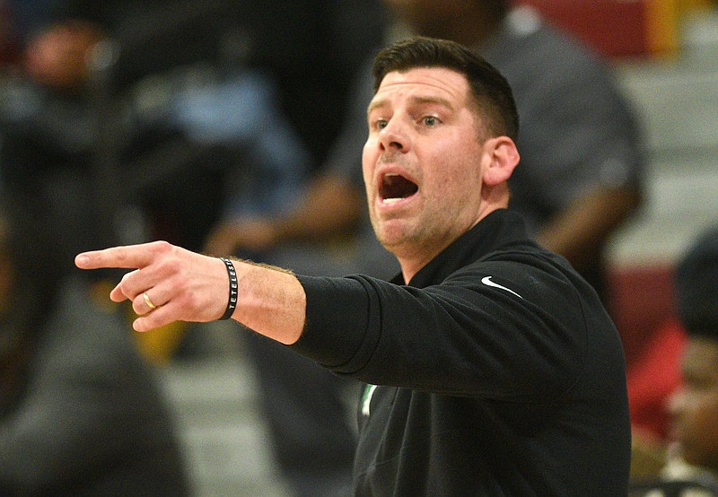 Staff photo by Matt Hamilton / Andy Webb coaches the East Hamilton boys' basketball team during a November 2022 game at Tyner. After four seasons leading the Hurricanes, Webb told his players Wednesday he has resigned for reasons related to family.