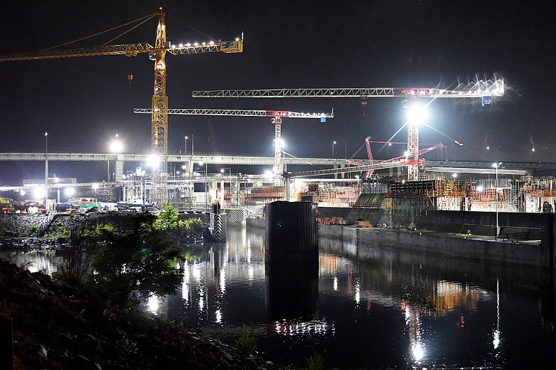 Staff Photo by Robin Rudd / Work continues before dawn Thursday on the Chickamauga Dam lock replacement.