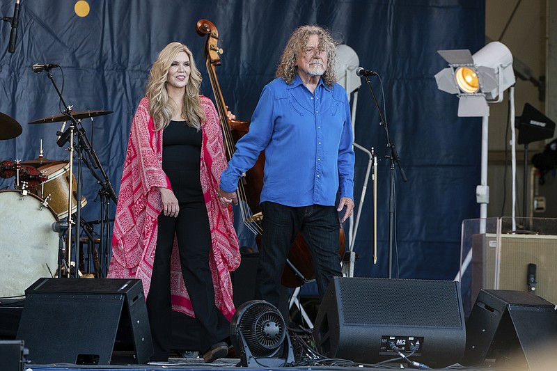 Alison Krauss, left, and Robert Plant perform at the 2023 New Orleans Jazz & Heritage Festival on April 28, 2023, at the Fair Grounds Race Course in New Orleans. They'll bring their Raising the Roof tour to Memorial Auditorium on May 13. / Photo by Amy Harris/Invision/AP