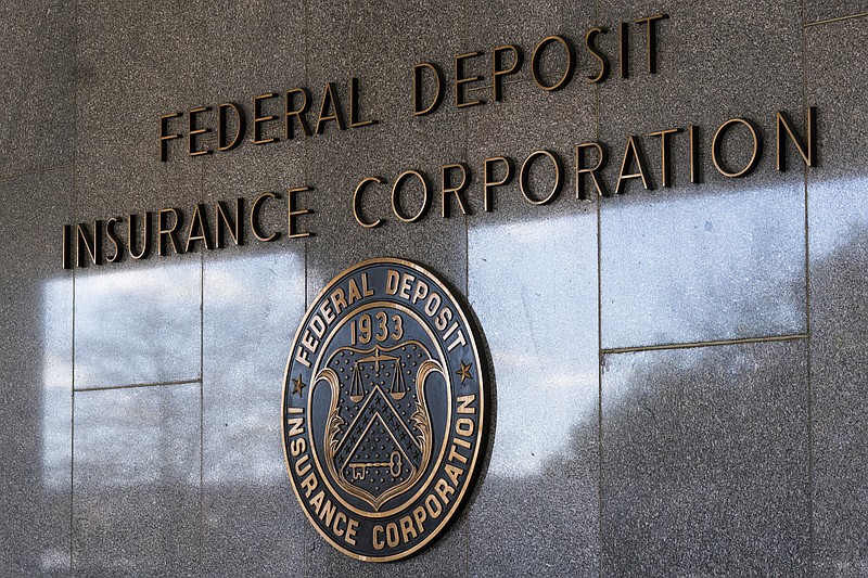 FILE - The Federal Deposit Insurance Corporation (FDIC) seal is shown outside its headquarters, March 14, 2023, in Washington. On Monday, May 1, the FDIC recommended that the U.S. rethink its decades-old policy of insuring up to $250,000 in bank deposits and replace it with an overhaul that would allow regulators to cover higher amounts on a “targeted” basis. (AP Photo/Manuel Balce Ceneta, File)