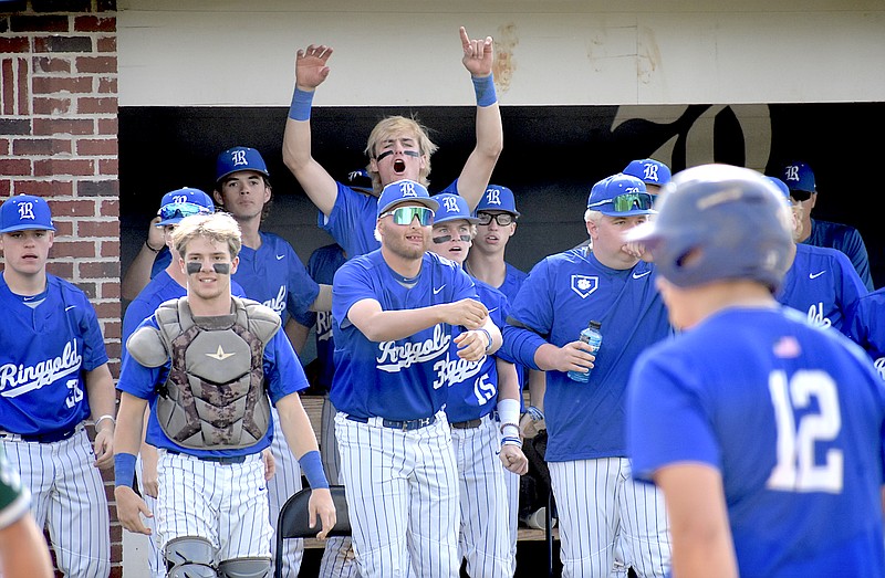 Staff photo by Patrick MacCoon / Ringgold players celebrate after Cade Tankersley (12) scores in Monday's 7-1 win over Wesleyan.