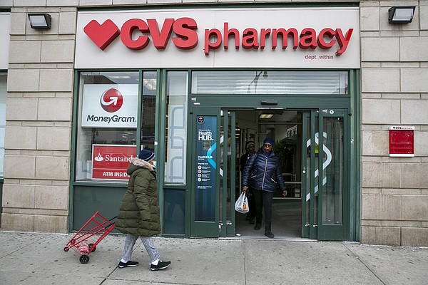 cvs-beats-earnings-forecast-but-cuts-outlook-after-buying-spree