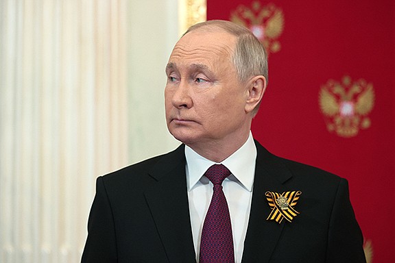 Russian President Vladimir Putin attends celebrations of the 78th anniversary of the end of World War II in Kremlin, in Moscow, Russia, Monday, May 9, 2022. (Vladimir Smirnov, Sputnik, Kremlin Pool Photo via AP)