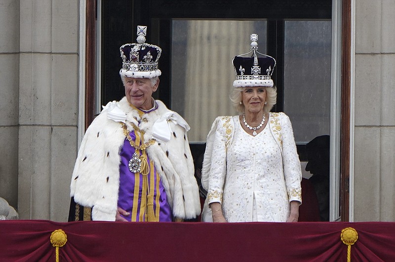 Photo/Andrew Testa/The New York Times / King Charles III and Queen Camilla appear on the Buckingham Palace balcony after his coronation in London on Saturday, May 6, 2023.