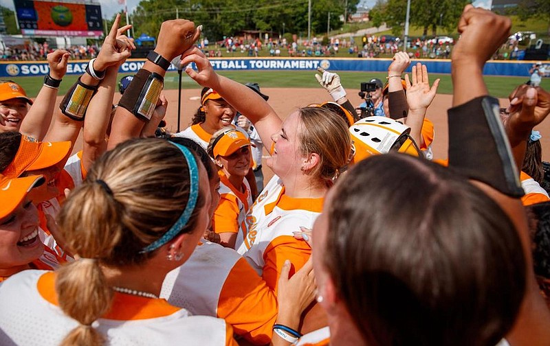 Tennessee Athletics photo / Jubilant Tennessee softball players surround Ashley Rogers after the former Meigs County pitcher recorded the final out of Saturday's 3-1 victory over South Carolina in the Southeastern Conference tournament championship game.