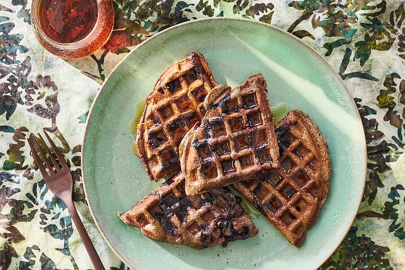 These nutty buckwheat waffles are naturally gluten-free and bright from lemon zest. / Kelly Marshall/The New York Times