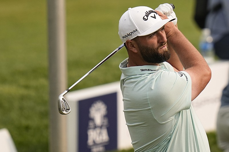 Jon Rahm, of Spain, works at the range during a practice round for the PGA Championship golf tournament at Oak Hill Country Club on Tuesday, May 16, 2023, in Rochester, N.Y. (AP Photo/Eric Gay)