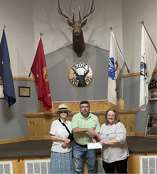 Contributed photo / As part of its commitment to community service, the Chattanooga Elks Lodge recently donated $2,000 to two local food pantries: the Apison Food Pantry and the St. Vincent de Paul Food Pantry. At the check presentation, from left, are Elizabeth McWilliams. Elks Lodge grant chair; David Thompson Sr., Elks Lodge president; and Karen Baldwin, who is with the St. Vincent de Paul Food Pantry.
