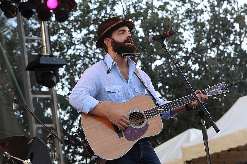 Photo by John Davisson / Invision / AP / Drew Holcomb and The Neighbors perform in Fort Lauderdale, Florida, in 2013.
