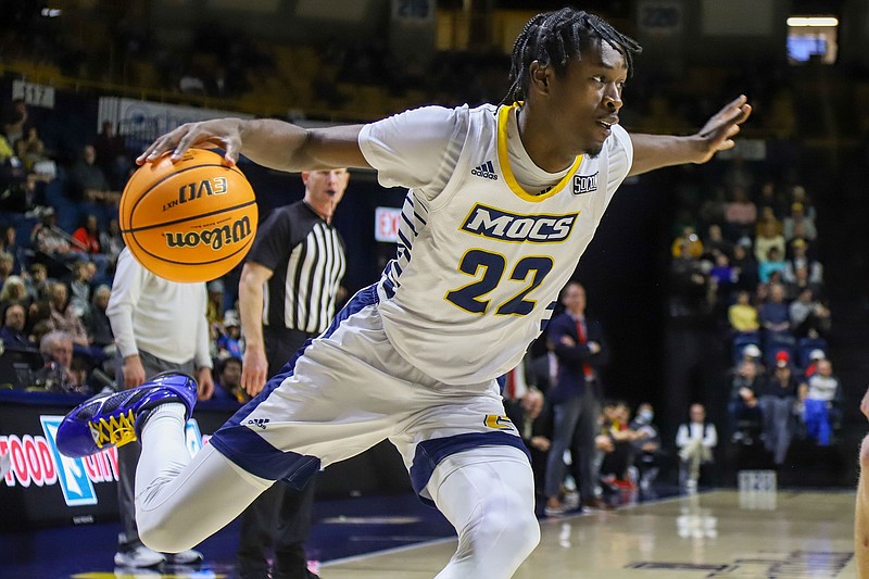 Staff file photo by Olivia Ross / Demetrius Davis started all 35 games as a junior this past season, his first at UTC, and he'll be counted on as a voice of experience for a largely inexperienced group of Mocs entering the 2023-24 schedule.