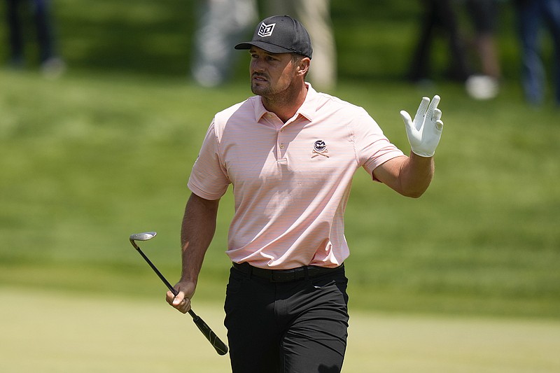 AP photo by Seth Wenig / Bryson DeChambeau waves after his chip on the 16th hole during the first round of the PGA Championship on Thursday at Oak Hill Country Club in Pittsford, N.Y.