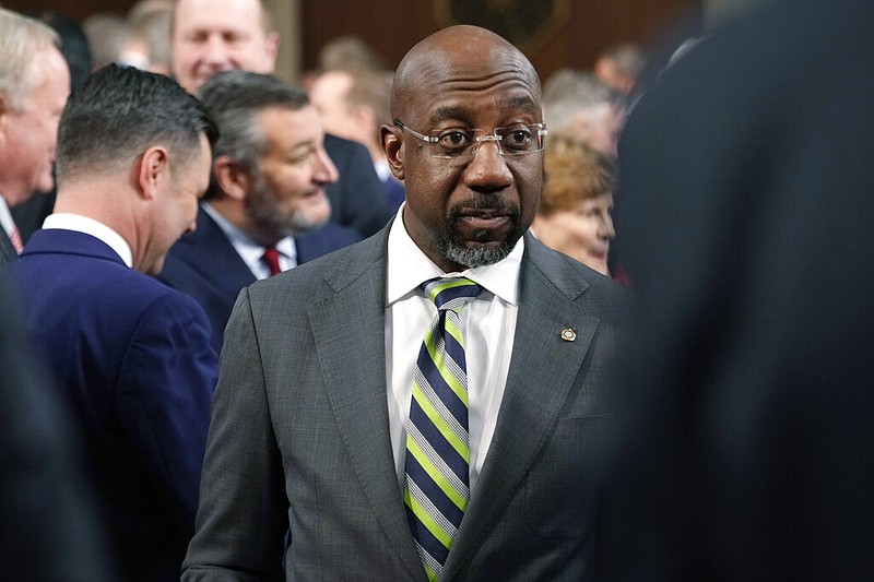 Sen. Raphael Warnock, D-Ga., arrives before President Joe Biden delivers the State of the Union address to a joint session of Congress on Feb. 7 at the Capitol in Washington. (AP Photo/Jacquelyn Martin, Pool)