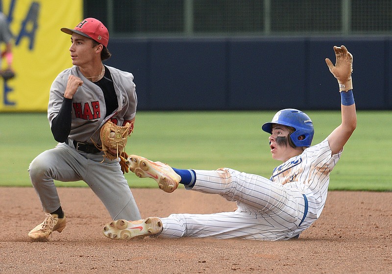 Staff photo by Matt Hamilton / Harlem's Jackson Decker celebrates after tagging out Ringgold's Sam Crew at second on a steal attempt during the opening game of the GHSA Class AAA championship series against Harlem on Friday at AdventHealth Stadium in Rome, Ga. Harlem won the first game, 5-3, and went on to sweep the Tigers and win the title.