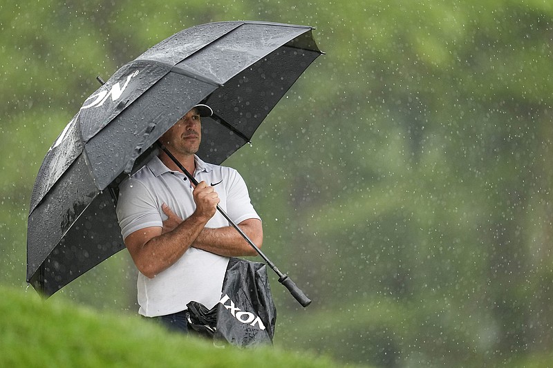 AP photo by Abbie Parr / Brooks Koepka waits to play on the 16th hole at Oak Hill Country Club during the third round of the PGA Championship on Saturday in Pittsford, N.Y. Koepka impressed with a 66 on a rainy day, shooting the low score for the second straight round and taking a one-stroke lead after 54 holes while seeking his fifth major championship.