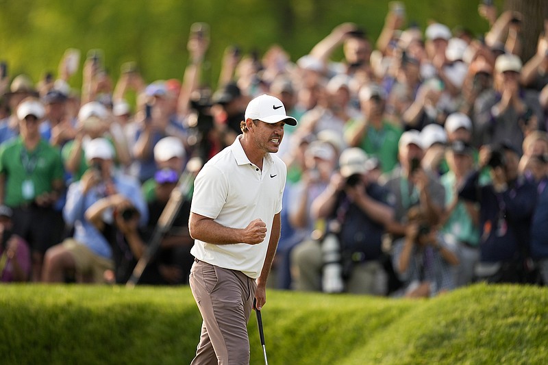AP photo by Abbie Parr / Brooks Koepka celebrates Sunday at Oak Hill Country Club in Pittsford, N.Y., after winning the PGA Championship for the third time and running his count of major golf championships to five overall. Koepka has also won the U.S. Open twice.