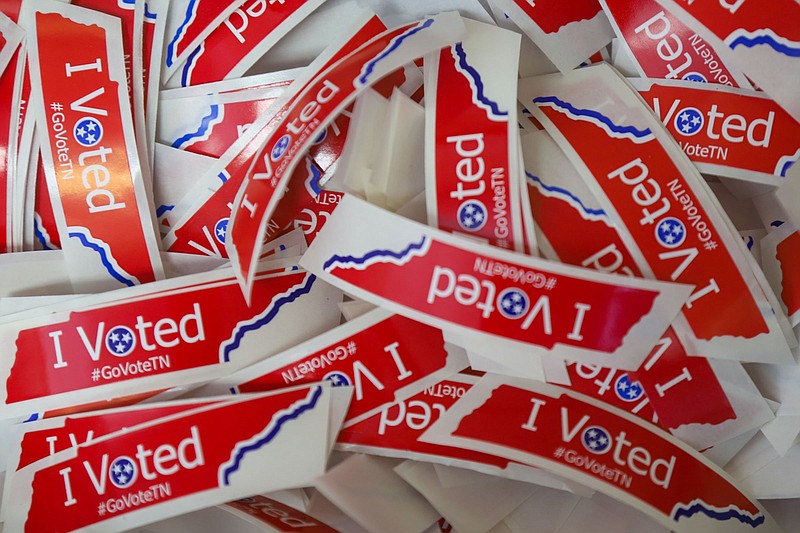 Staff File Photo / Stickers await voters for early voting at the Hamilton County Election Commission in July 2022.