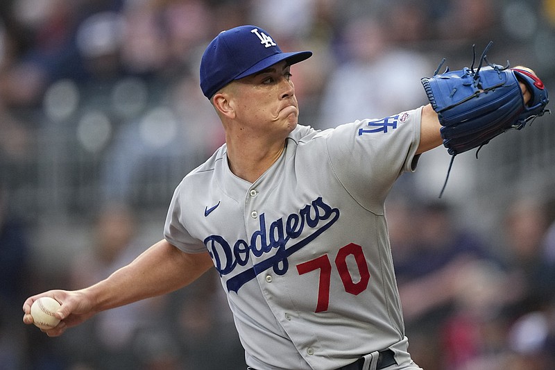 Los Angeles Dodgers starting pitcher Bobby Miller delivers in the first inning of a baseball game against the Atlanta Braves, Tuesday, May 23, 2023, in Atlanta. Miller was making his Major League debut. (AP Photo/John Bazemore)