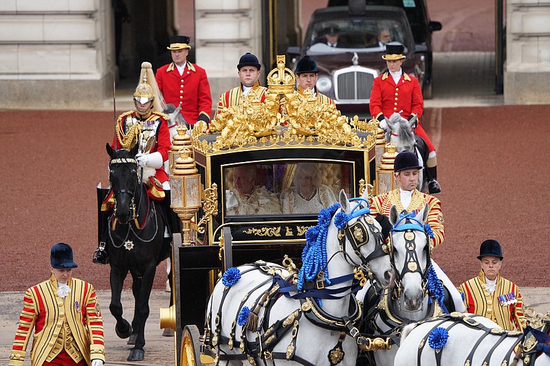 Photo/Andrew Testa/The New York Times / King Charles and Queen Camilla depart Buckingham Palace for his coronation at Westminster Abbey in London on Saturday, May 6, 2023.