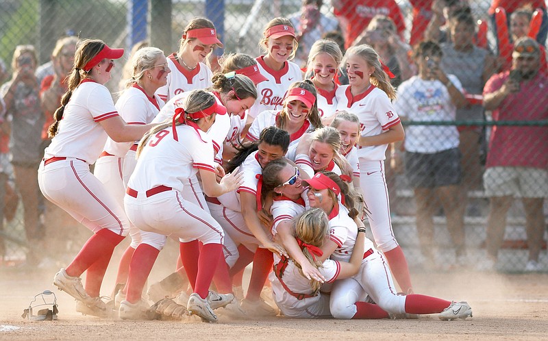 Staff photo by Robin Rudd / Baylor softball players celebrate their victory after beating Chattanooga Christian 9-5 to win the TSSAA Division II-AA state title Thursday night in Murfreesboro, Tenn. It's the eighth title in a row for the Lady Red Raiders, extending a TSSSAA record.