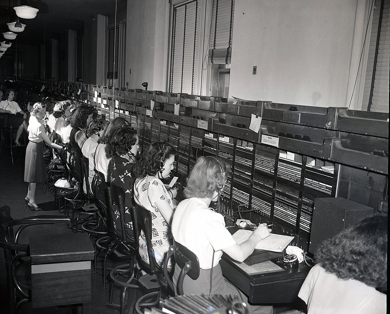 Chattanooga News-Free Press archive photo via ChattanoogaHistory.com / This photograph was taken by newspaper photographer Delmont Wilson in 1947 and shows telephone operators in Chattanooga back at work after a five-week work stoppage.