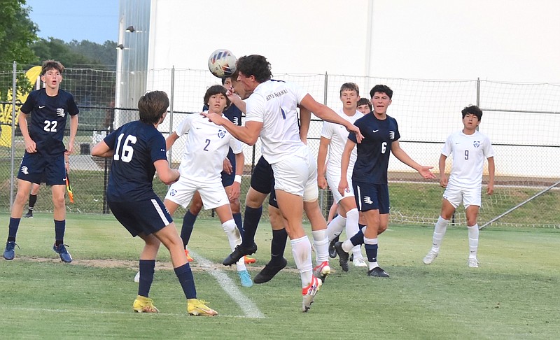 Staff photo by Patrick MacCoon / Boyd Buchanan's Mills Wood heads the ball in the first half of Thursday's TSSAA Division II-A boys' soccer state final against Lausanne Collegiate in Murfreesboro, Tenn.