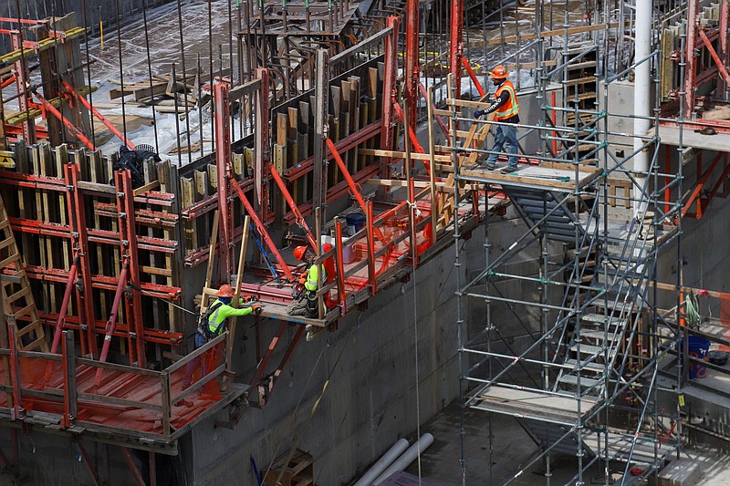 Staff Photo By Olivia Ross / Work on the new Chickamauga Lock continues earlier this week, with the U.S. Army Corps of Engineers celebrating the first “topped out” concrete monolith in the replacement project.