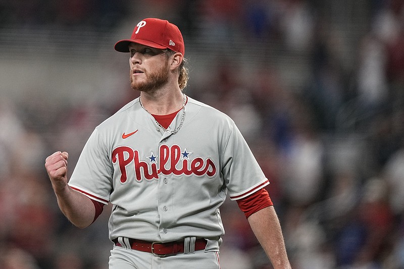 AP photo by Brynn Anderson / Philadelphia Phillies reliever Craig Kimbrel celebrates after closing out Friday's 6-4 win against the host Atlanta Braves for the 400th save of his career.