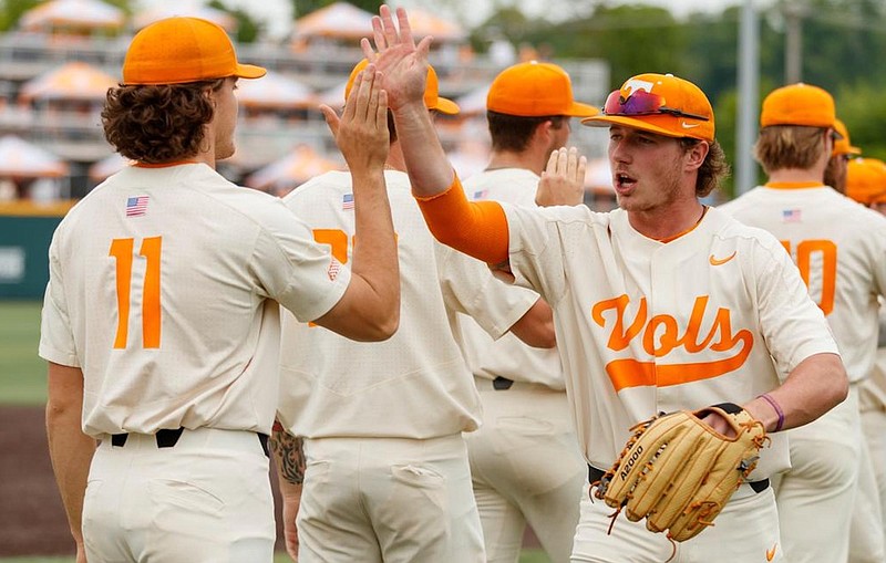 Tennessee Athletics photo / Tennessee pitcher Chase Dollander (11) and left fielder Jared Dickey celebrate following a win late last month over Mississippi State in Knoxville. The Vols have been seeded second in the Clemson Regional of the NCAA tournament, which starts Friday.