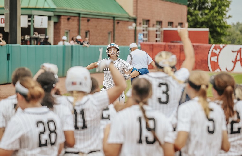 MTSU photo / Middle Tennessee State freshman Ansley Blevins, a GPS graduate from Jasper, Tenn., celebrates as she runs down the third-base line toward her teammates after hitting a home run against host Alabama in the NCAA softball tournament's Tuscaloosa Regional on May 20.