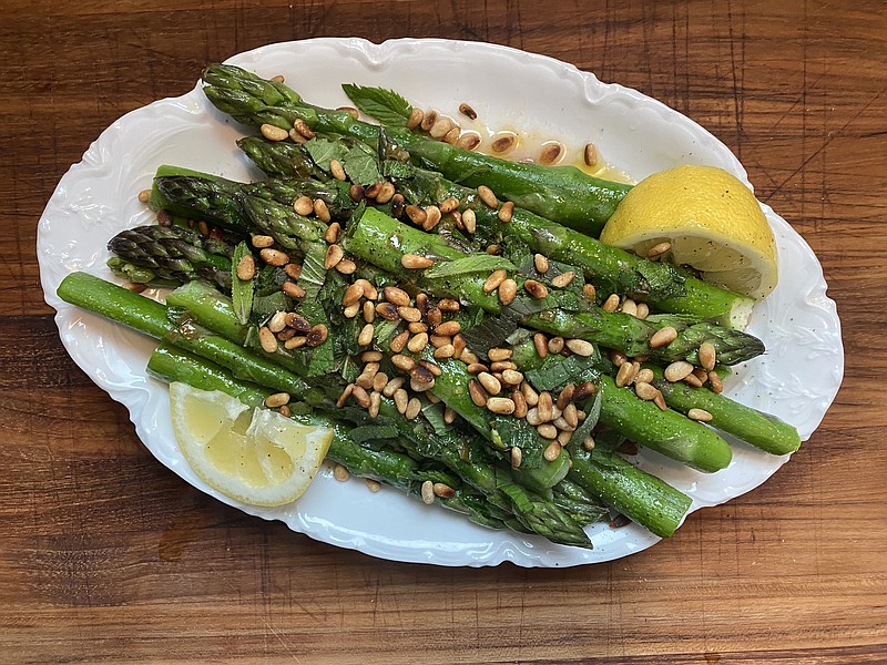 Choose your own asparagus adventure with Bethany Jean Clement's customizable recipe incorporating your choice of fresh herbs and lots of butter. / Bethany Jean Clement/The Seattle Times/TNS