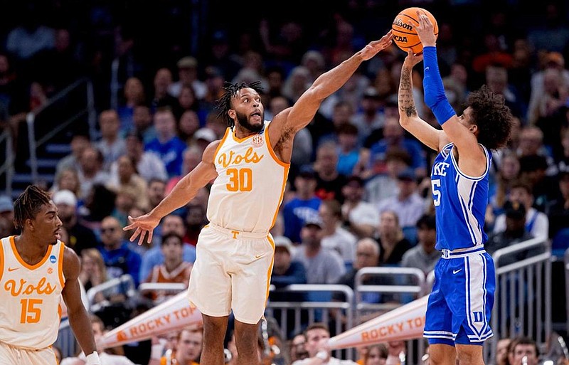 Tennessee Athletics photo / Josiah-Jordan James extends for a blocked shot during Tennessee's 65-52 win over Duke in the second round of the 2023 NCAA tournament. James announced Wednesday that he is returning for a second senior season with the Volunteers.