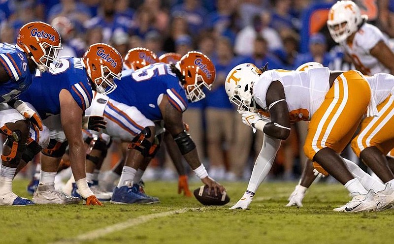 Tennessee Athletics photo by Andrew Ferguson / Florida and Tennessee line up for a play during their 2021 meeting in Gainesville, which the Gators won 38-14.
