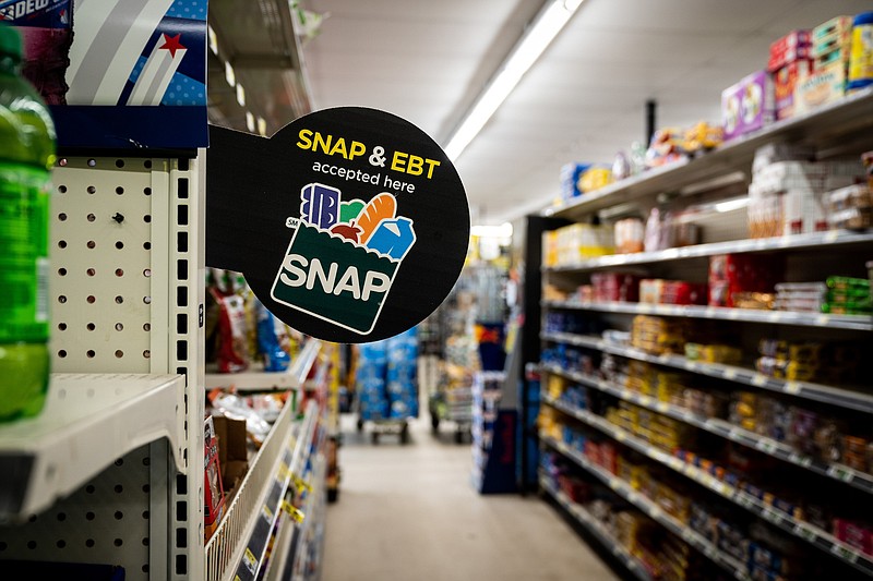 Photo/Erin Schaff/The New York Times / Shelves of food items are seen in a grocery store aisle in Lexington, S.C., on Aug. 10, 2021. The debt limit agreement includes new work requirements older adults who receive food stamps through the Supplemental Nutrition Assistance Program.