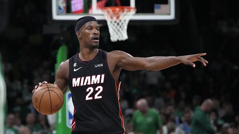 AP photo by Charles Krupa / Miami Heat forward Jimmy Butler directs his teammates during Monday night's road win against the Boston Celtics in Game 7 of the NBA's Eastern Conference title series.