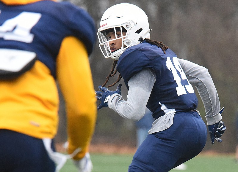 For Artopoeus, joining UTC football roster was a chess move