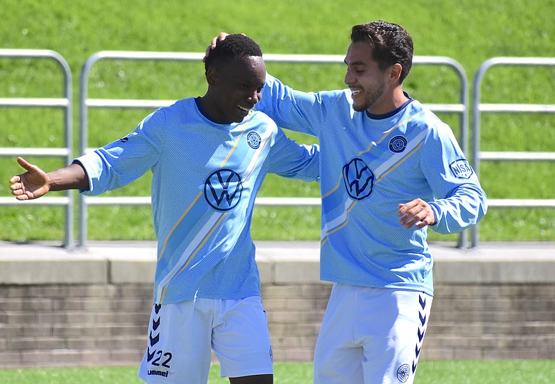 Staff file photo by Patrick MacCoon / Chattanooga FC's Mutaya Mwape, left, scored one goal and assisted on another in Saturday's 2-1 comeback victory over the host Maryland Bobcats.