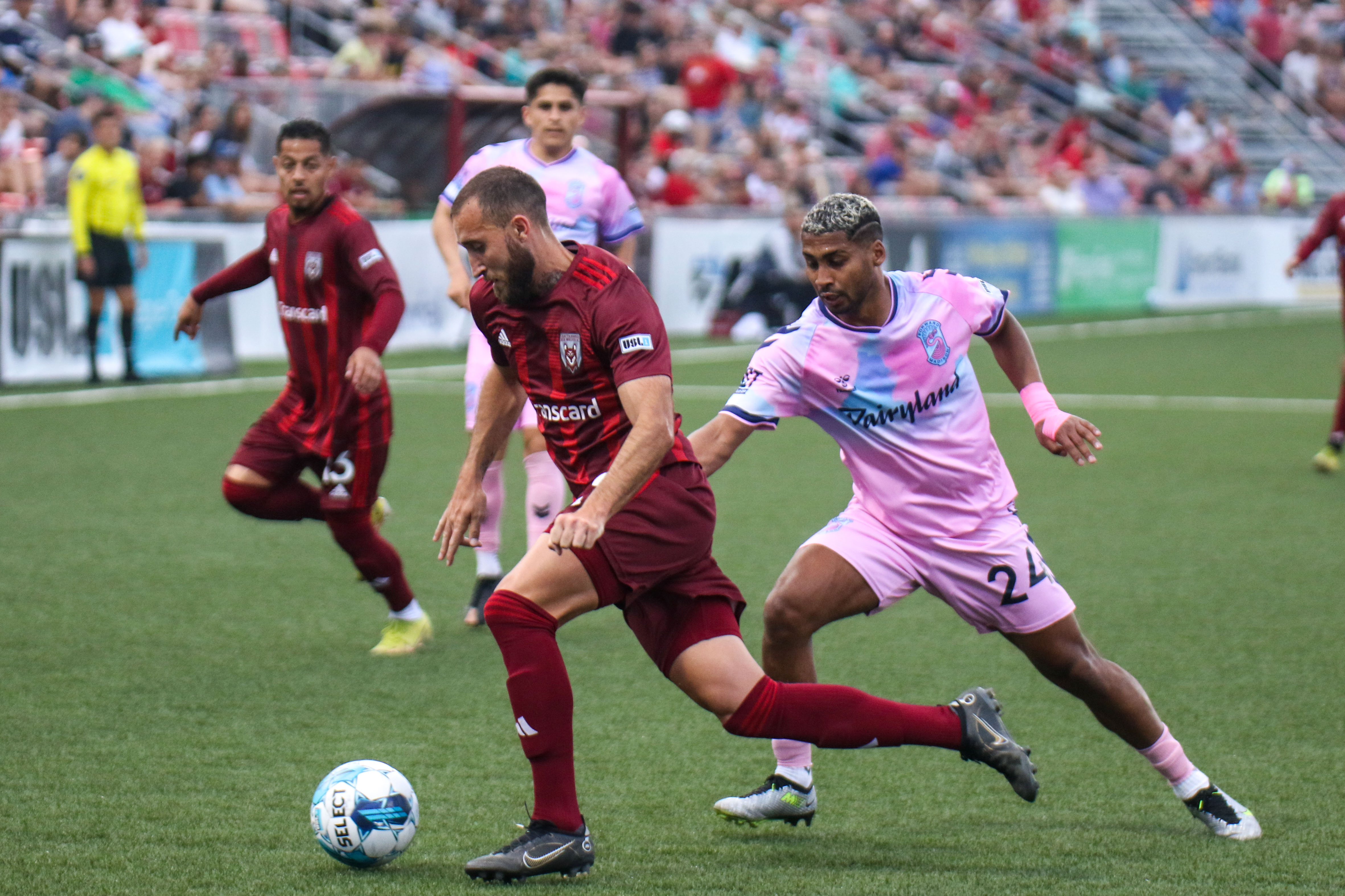 Staff photo by Olivia Ross / Chattanoogas Aaron Lombardi (22) keeps the ball from Madison. The Chattanooga Red Wolves took on Forward Madison on Wednesday, June 7, 2023.