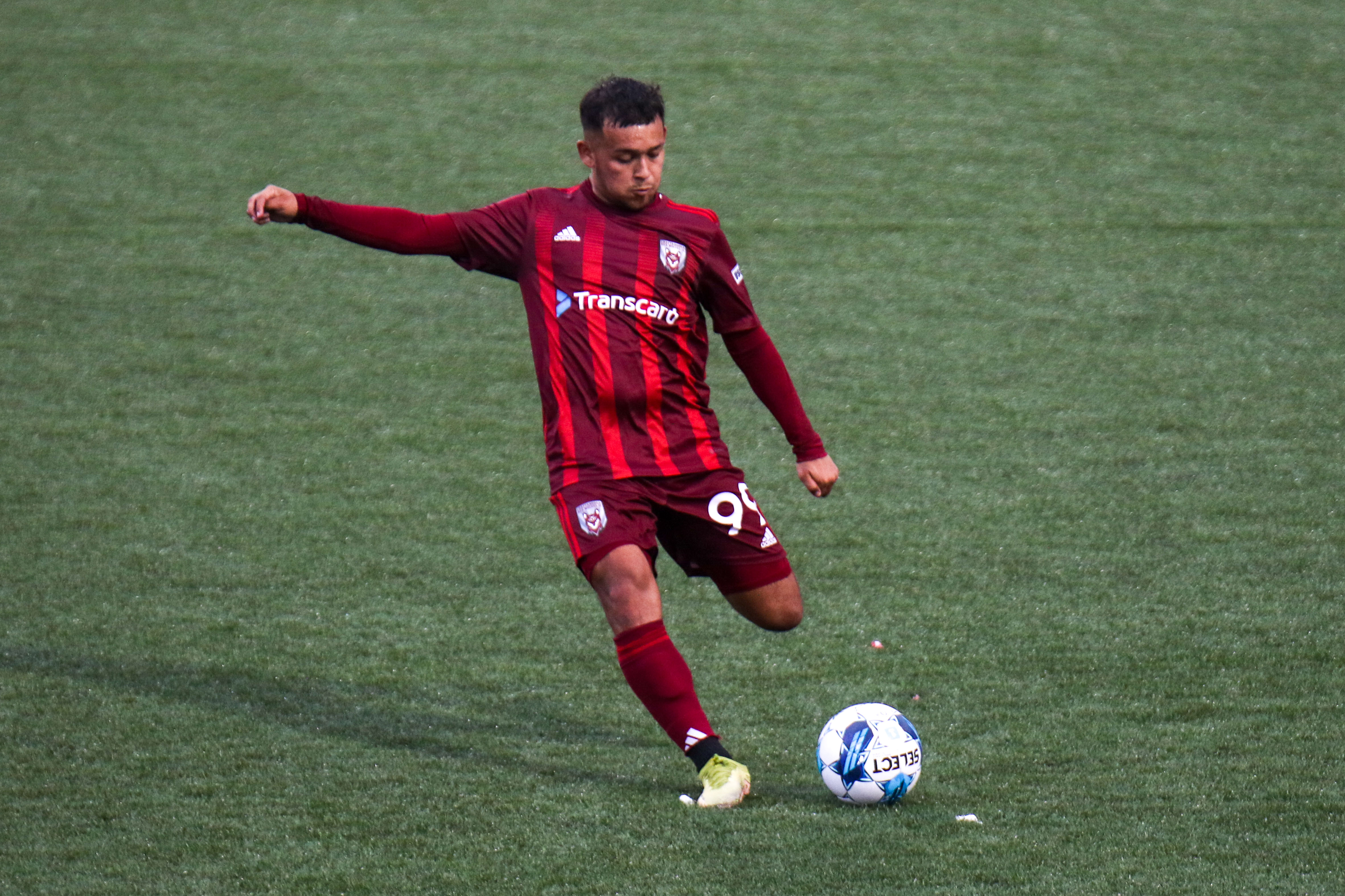 Staff photo by Olivia Ross / Chattanoogas Moe Espinoza (99) shoots, Red Wolves soon score from this kick. The Chattanooga Red Wolves took on Forward Madison on Wednesday, June 7, 2023.