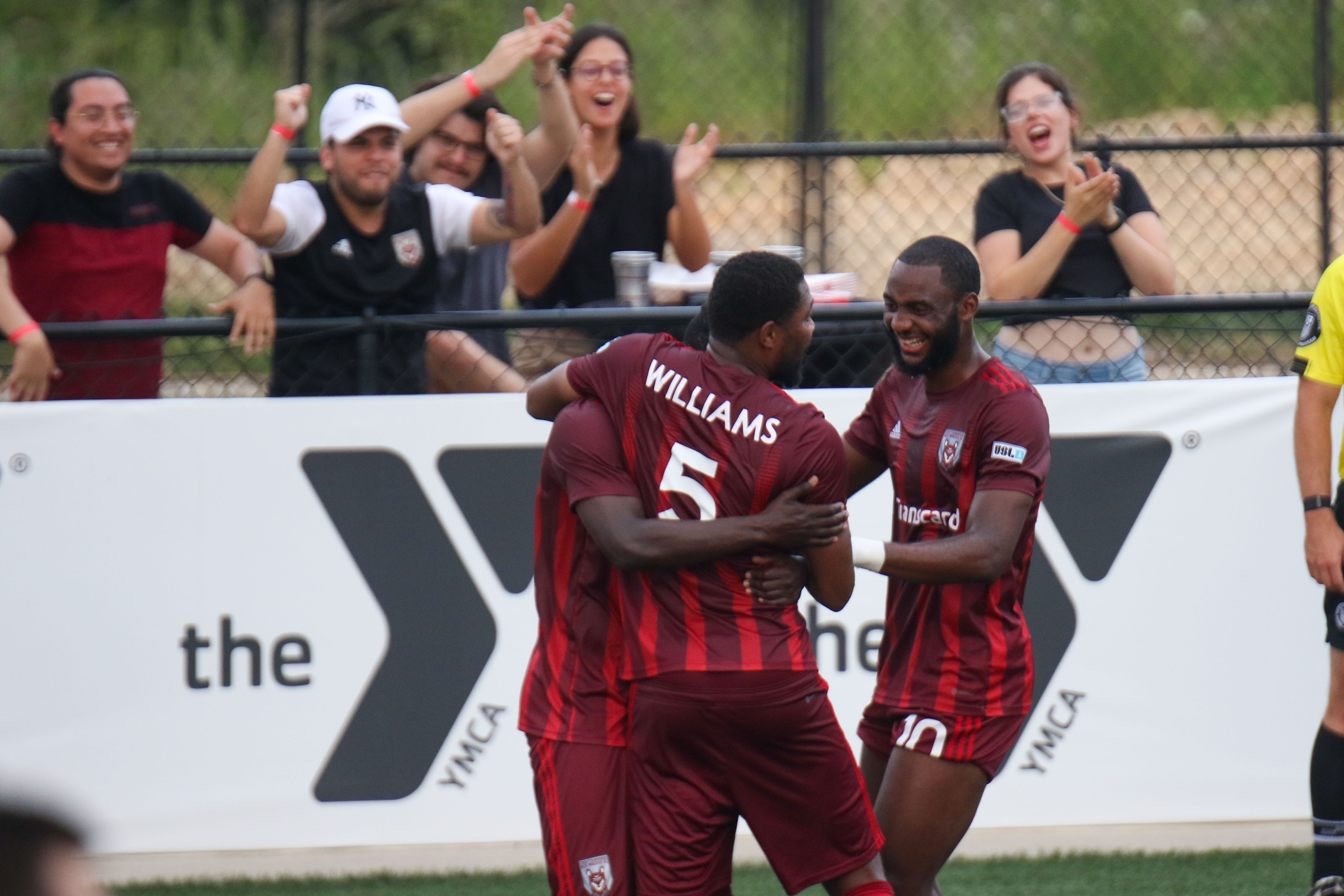 Staff photo by Olivia Ross / The Red Wolves and fans cheer after their goal. The Chattanooga Red Wolves took on Forward Madison on Wednesday, June 7, 2023.