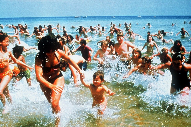Beach goers run from the water in a scene from the 1975 release of "Jaws" in this undated handout photo. The classic movie will play July 28 at Walker Theatre as part of the Bobby Stone Film Series. / AP Photo/Universal Studios/File