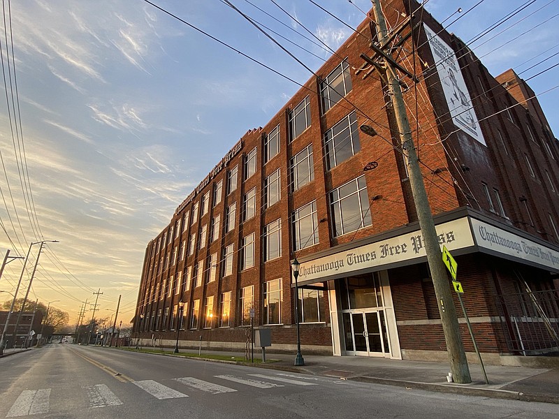 Staff photo by Robin Rudd / The Chattanooga Times Free Press building is seen as the sun rises on March 21, 2023.
