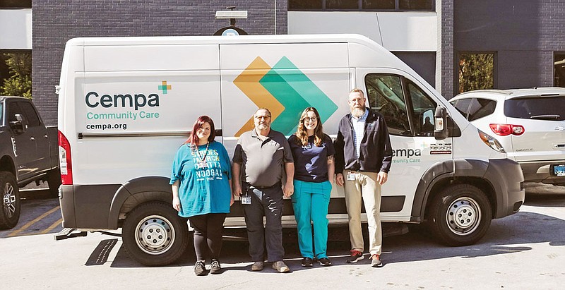 Photography courtesy of Cempa Community Care / Members of the Cempa Community Care Prevention Team stand by the HIV Testing Van. From left to right: Shelbie Cook, prevention specialist; Mario Forte, PrEP navigator; Chelsea Dawson, prevention specialist; and Robert Cornelius, prevention program manager.