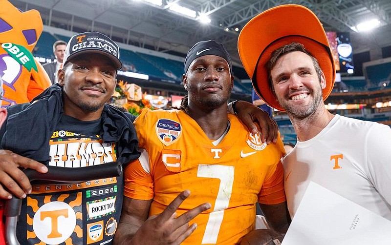 Tennessee Athletics photo / Quarterbacks Hendon Hooker and Joe Milton III celebrate with quarterbacks coach Joey Halzle following Tennessee's 31-14 win over Clemson in last December's Orange Bowl. While Hooker is now with the Detroit Lions, Milton is back along with Halzle, who is now offensive coordinator.