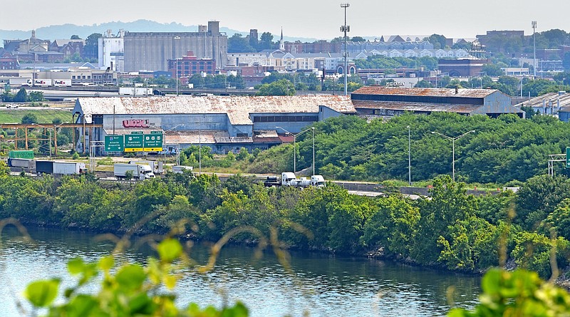 Staff Photo by Robin Rudd / Interstate 24 winds past the former U.S. Pipe/Wheland Foundry site in 2022. The property is to hold new development with a Chattanooga Lookouts stadium as the centerpiece.