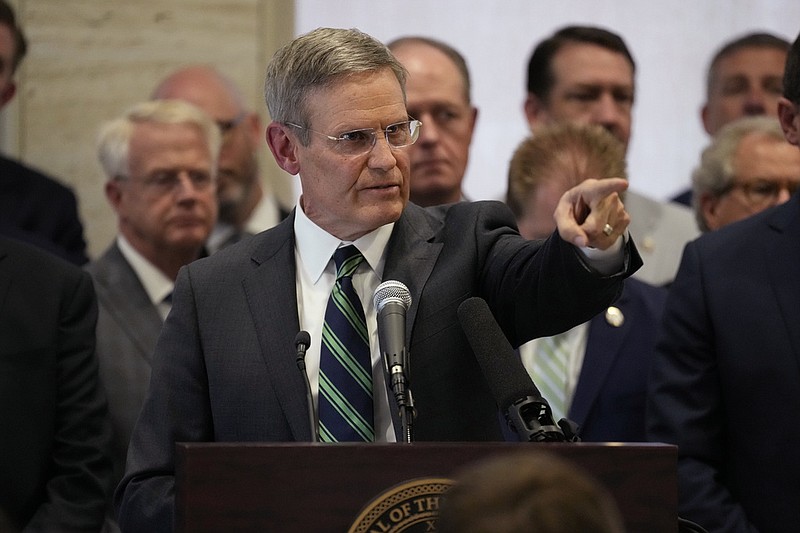 Gov. Bill Lee calls for a question during a news conference April 3 in Nashville, Tenn. Lee held a news conference with state legislative leaders to talk about proposed legislation to address gun violence in schools. (AP Photo/Mark Humphrey)
