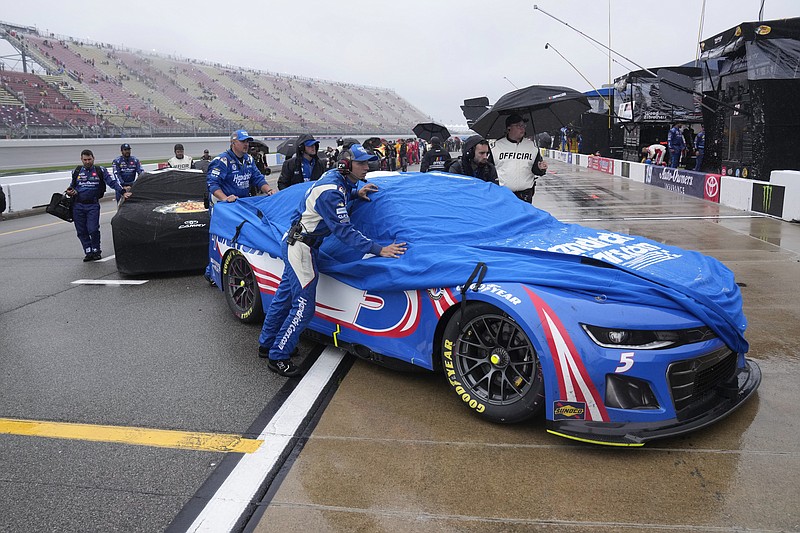 NASCAR race at Michigan suspended due to weather, set to resume Monday ...