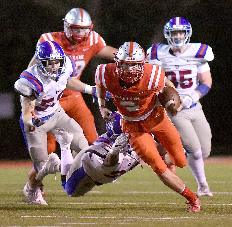 Staff photo by Matt Hamilton /  Baylor's Whit Muschamp, No. 10 on this year's Dynamite Baker's Dozen of the area's top college prospects, gains big yardage on a scramble vs. MUS during a playoff game last season.