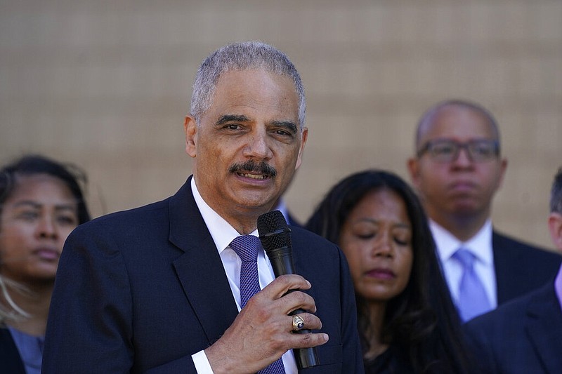 Former U.S. Attorney General Eric Holder, who is senior counsel at Covington & Burling in Washington, addresses the media in 2022 in Detroit. Holder, who represents Tennessee state Rep. Justin Jones, D-Nashville, wants Jones reinstated to his committee assignments for the upcoming special session of the General Assembly after voters officially returned Jones to the House last week. (AP Photo/Carlos Osorio)