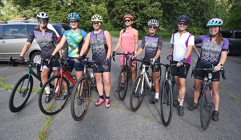 Staff photo by Matt Hamilton/ Members of the Velo Vixens gather before the start of their ride in Red Bank.